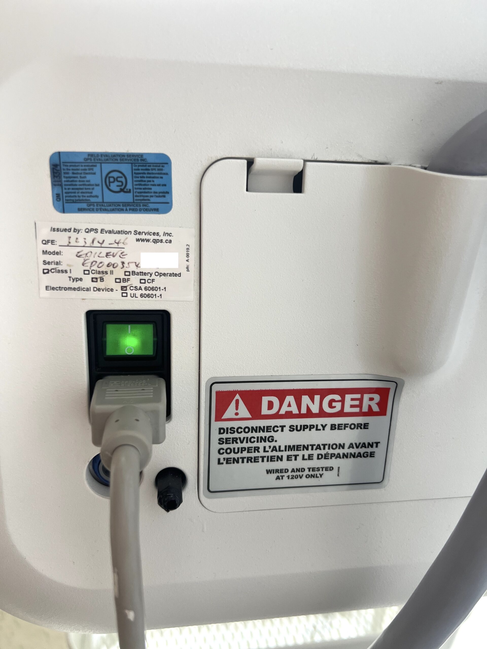 Venus Epileve power input panel with warning label