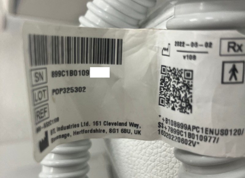 Emsculpt Neo device applicator barcode label close-up
