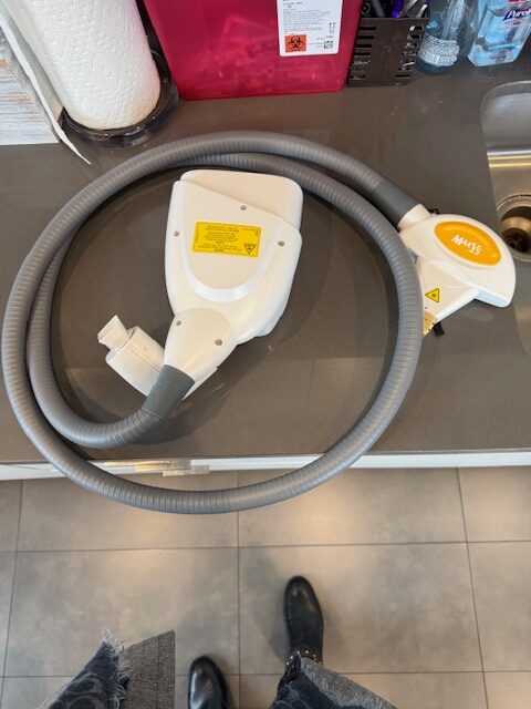 Cynosure Icon handpieces with cable connections and applicators