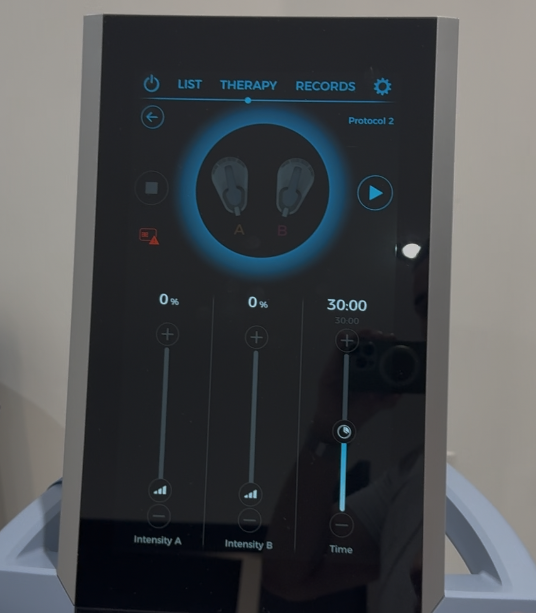 Emsculpt user touchscreen close-up