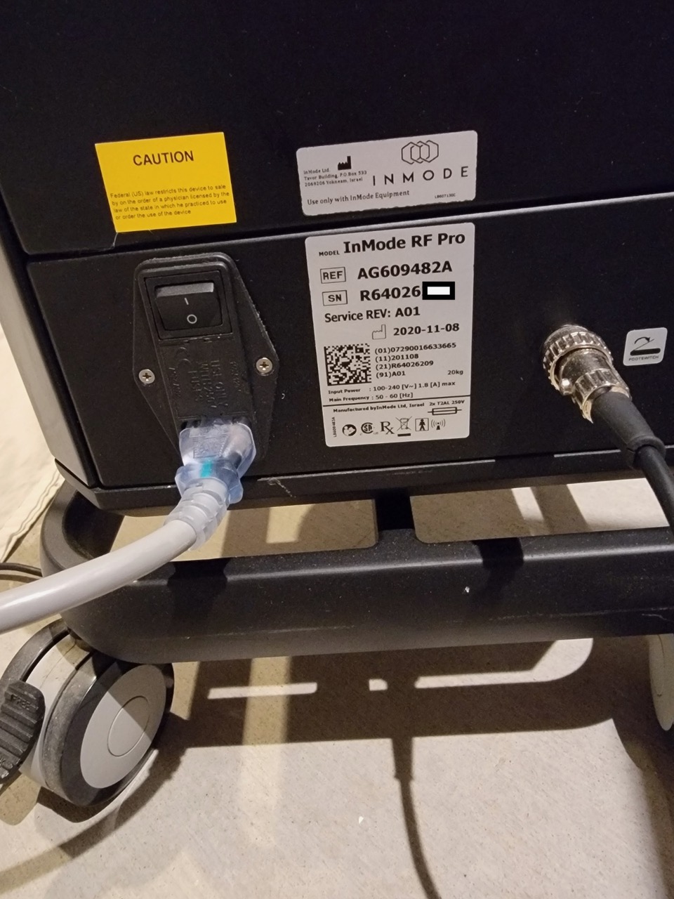 2020 InMode RF Pro system rear view showing manufacturer label and serial number plate