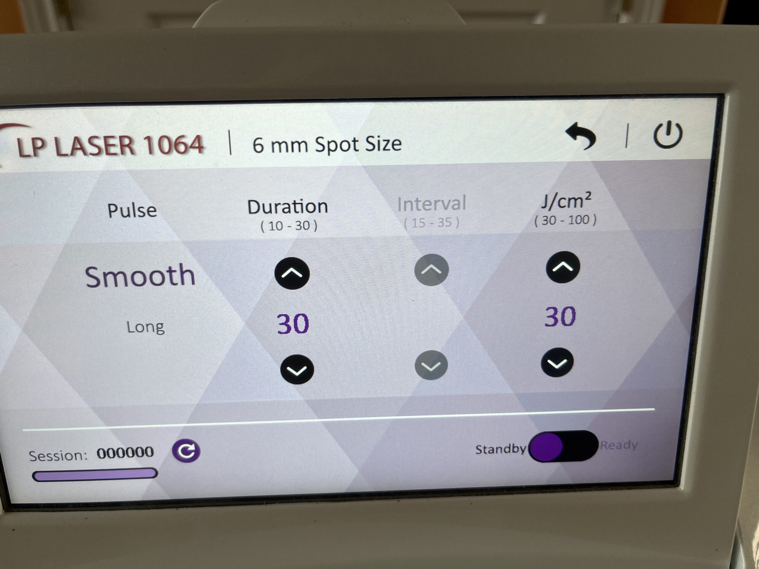 LP laser 1064 pulse and duration settings on touchscreen