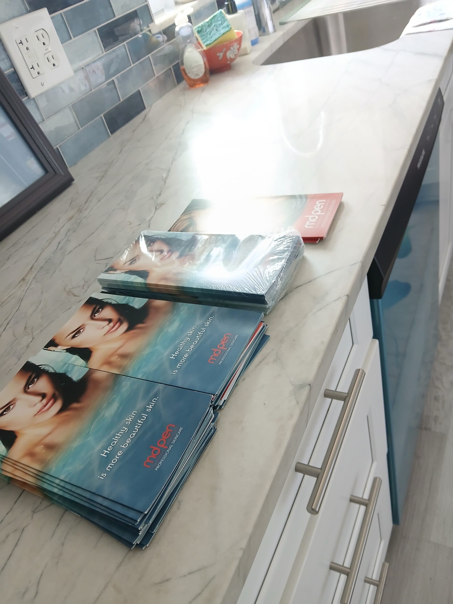 stacked mdpen brochures